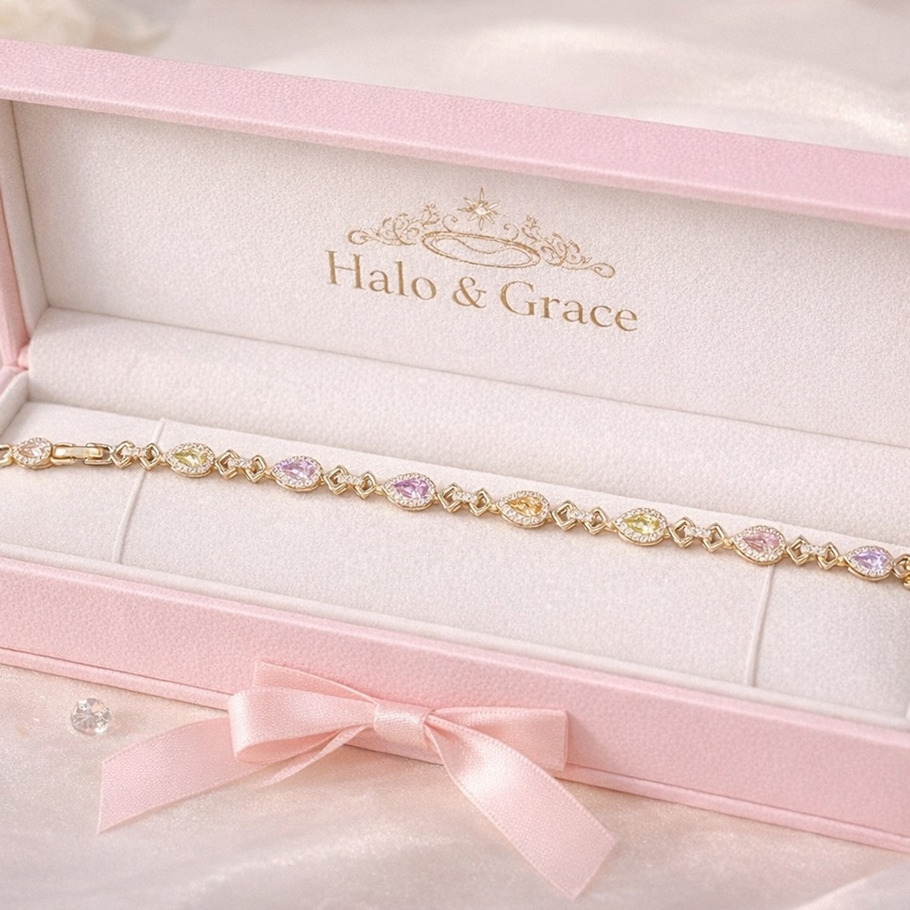 14k bracelet with multicolored tear drop design and pave setting